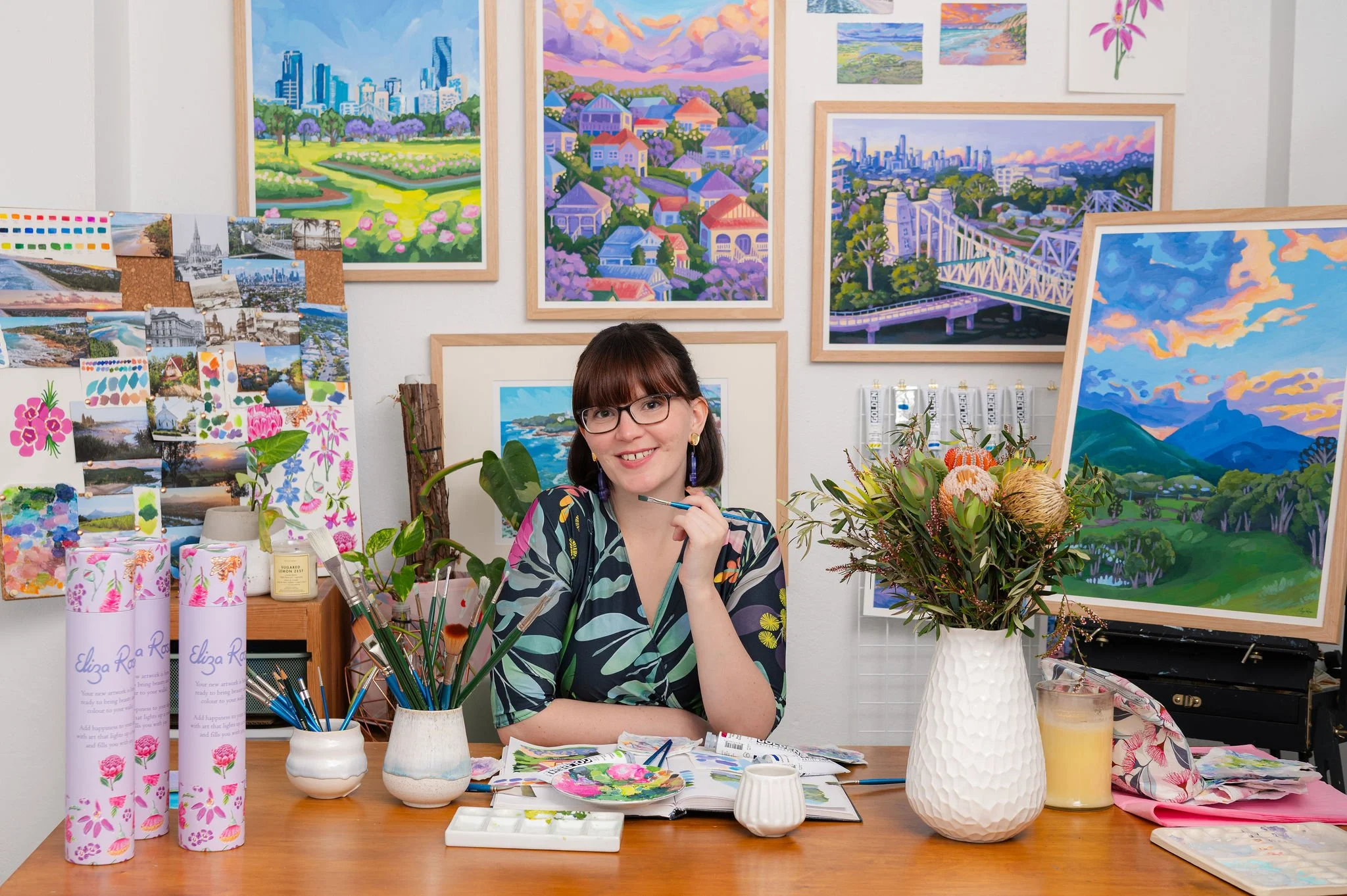 Brisbane artist captured mid-process creating vibrant nature-inspired artwork