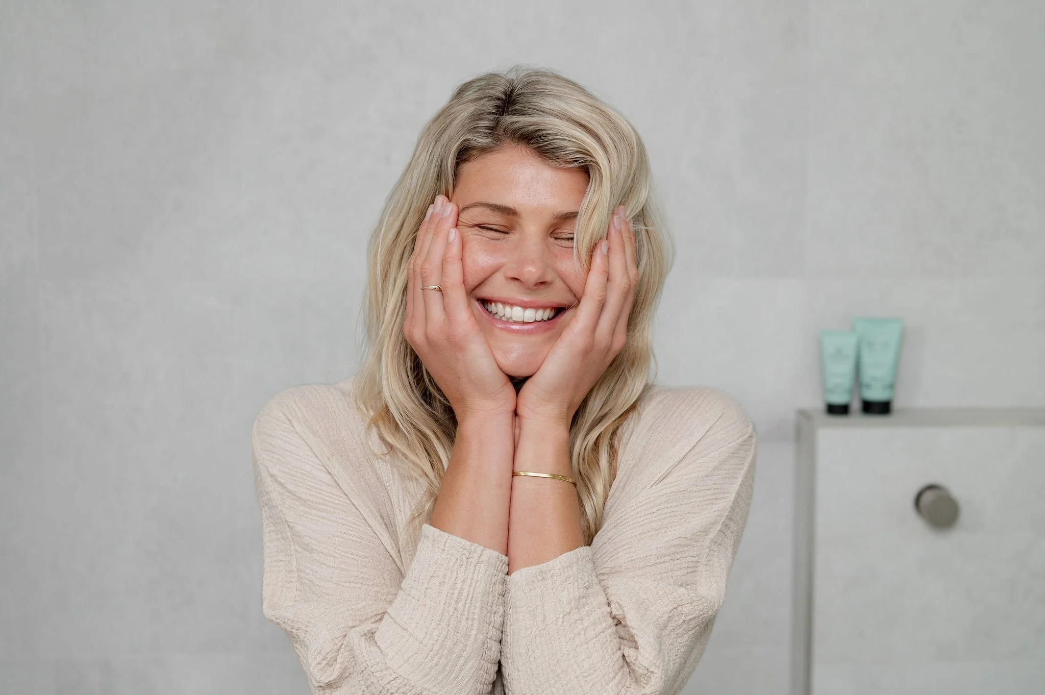 Mum and toddler playing together during a lifestyle skincare photoshoot at home