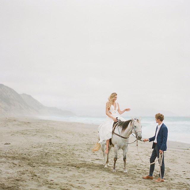 With backdrops of hills veiled in mist, they walked along the shore. 
MUA: @aprilfosterbridal 
PHOTOGRAPHER: @catherineliuphoto 
MODEL: @vkvsnkv @cjbews 
FILM SCAN: @richardphotolab .
.
.
.
.
.
.
.

#photography #photographer #weddingphotography #wed