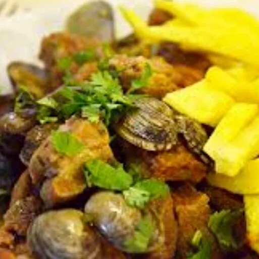 Solar De Caramulo: This is a locals secret for lunch. It is the most casual place we went to ever and when you walk in you wonder where you are. No one speaks English but that’s ok! Order the Pork Alentejana and the beef cheeks and you’ll be set.