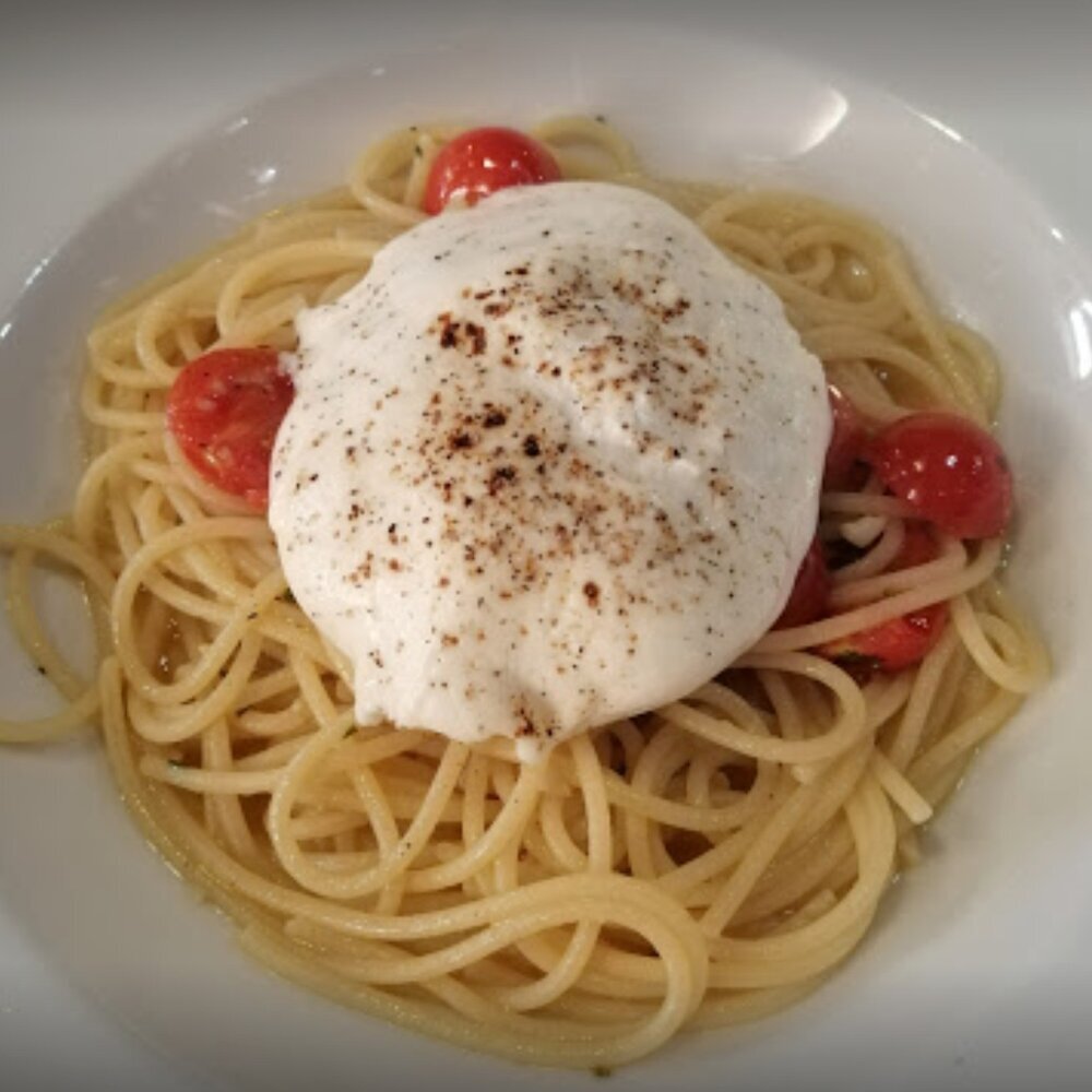 La Trattoria: Believe it you will get tiered of seafood and meat if you stay here a long time. We found this amazing Italian place in what could be an office building! Pizzas and pastas all homemade and delicious!