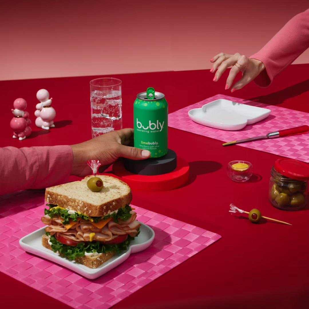 beautiful sandwich next to lime bubly sparkling water can