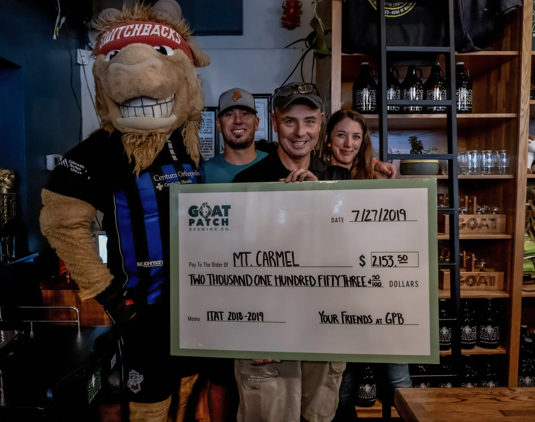 Mt. Carmel also was presented with a check from the It Takes A Tribe Red Ale proceeds. Photo courtesy Goat Patch Brewing.