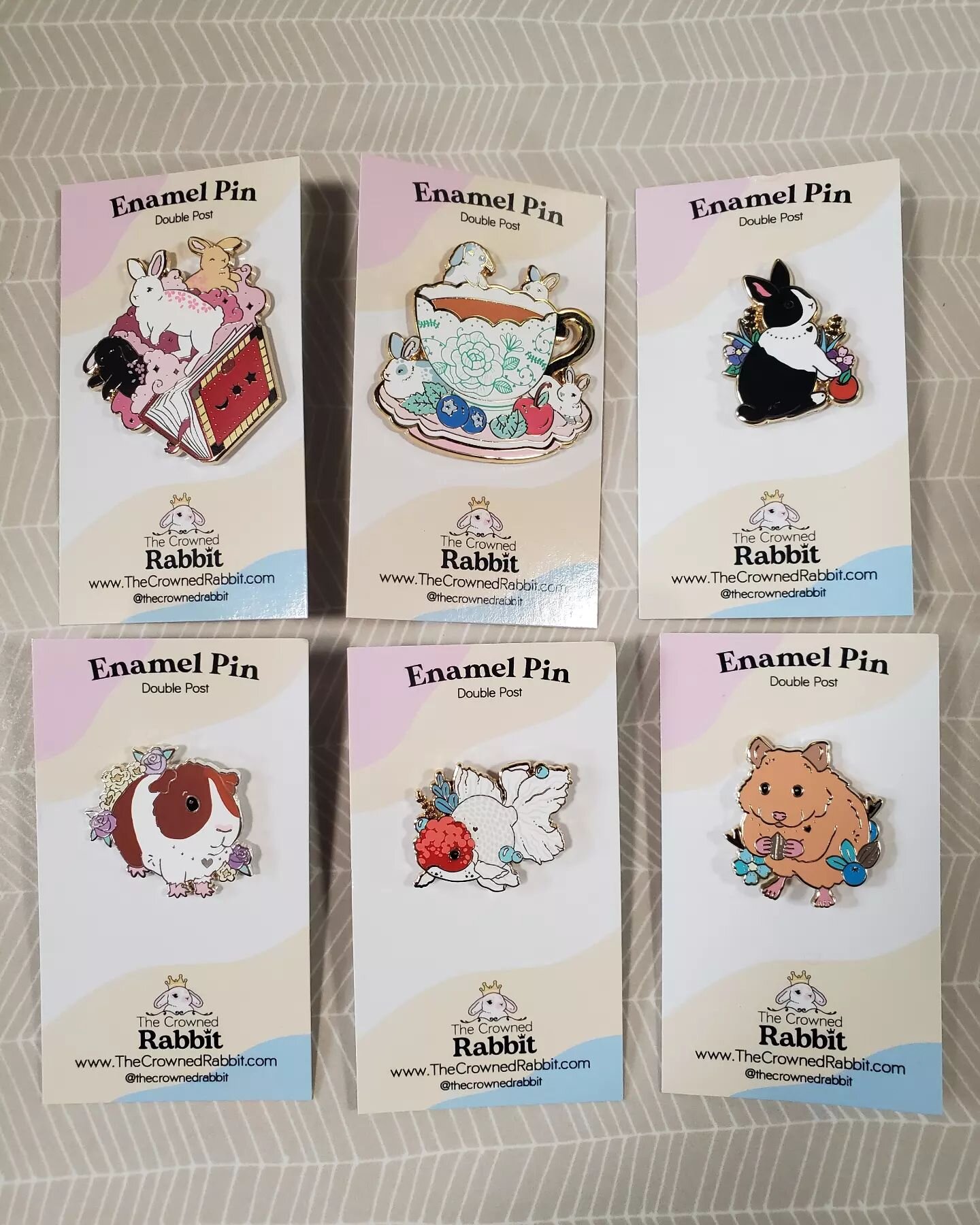 Adorable new enamal pins are here at Readers' Garden Book Store. 💫 Bunnies with books, bunnies around a tea cup, a black Dutch rabbit, a calico guinea pig, a red cap oranda goldfish and a brown hamster. 🐰📚☕🐹

#readersgardenbookstore #readersgarde