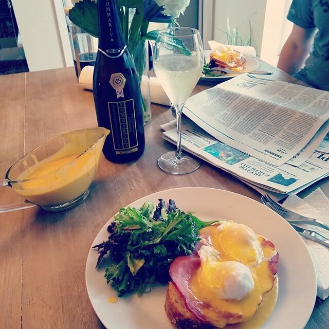 Lazy brunch with eggs Benedict, prosecco and the Sunday times