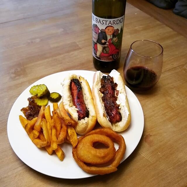 Homemade Seattle dogs, onion rings and fries with a dynamite sangiovese