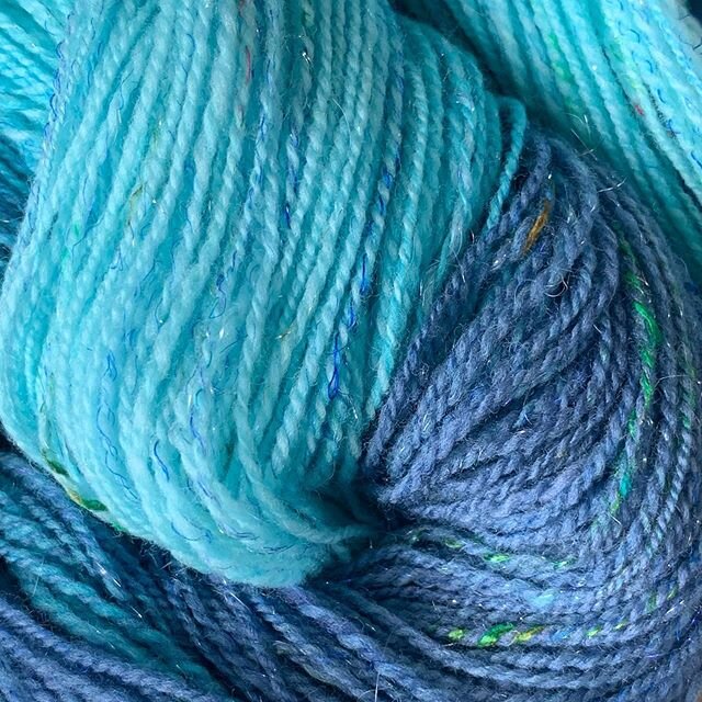 I could not be happier with how this came out! Recycled green sari silk, royal blue silk thrums, silver iris flash angelina, and aqua to denim blue ombr&eacute; merino ... SO SCRUMPTIOUS!!!!!
&mdash;
#Handspunyarn #handspun #handspinner #chybraidclub