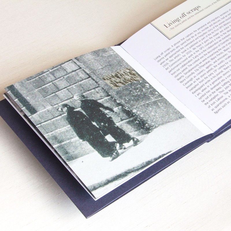 Double spread in artist's book with image of 2 women walking away 