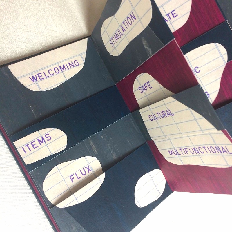 Handmade flexigon artist's book with words about libraries printed in it by artist eilis murphy