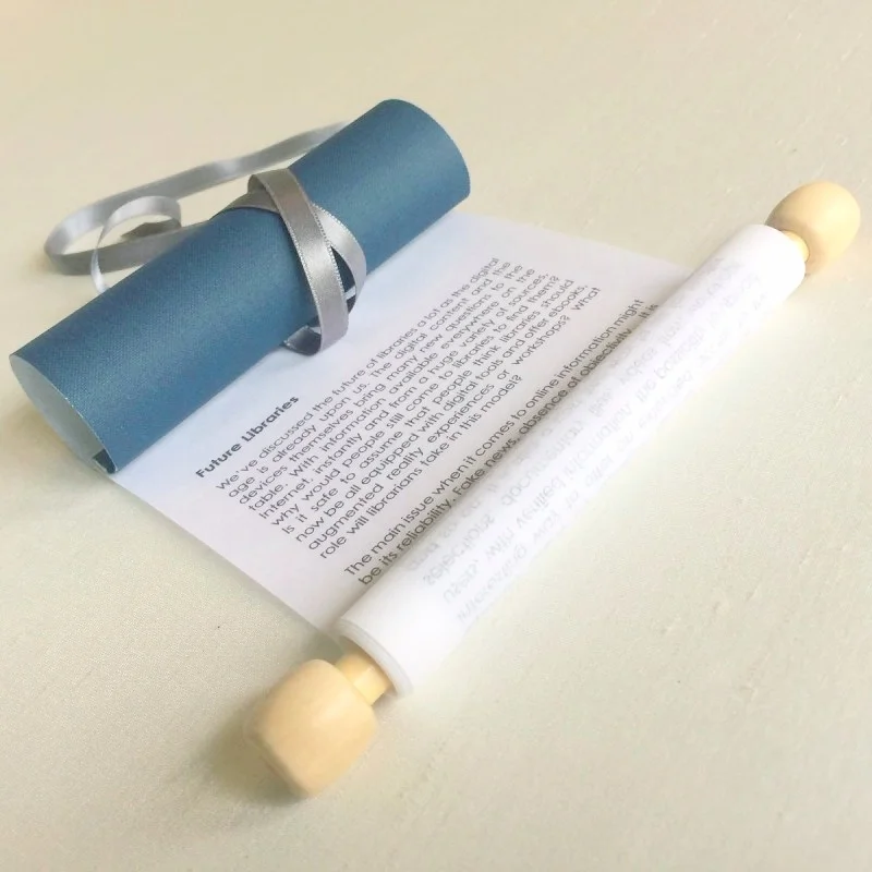 Handscroll made from wood, paper and navy backcloth, unwound to show text 