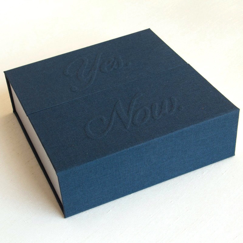 Handmade box with Yes Now embossed on navy cover by artist eilis murphy
