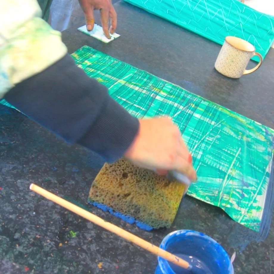 Making paste paper with green paint