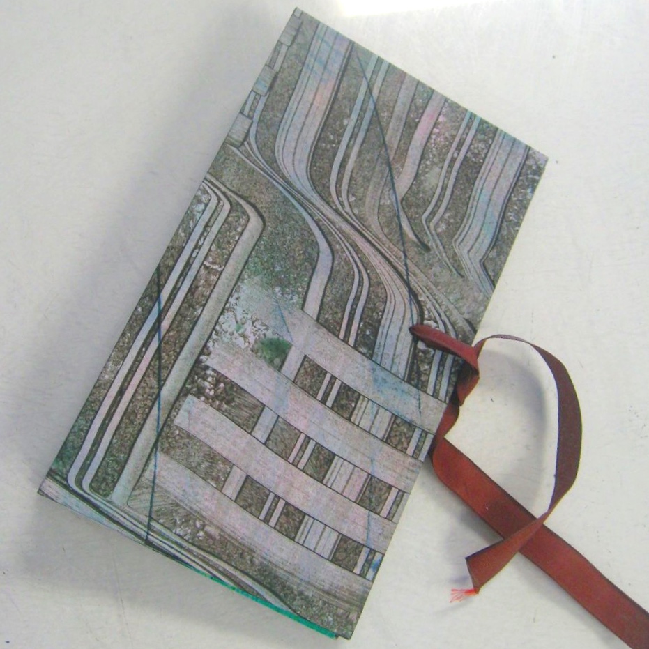 Paste paper cover on handmade artist's book