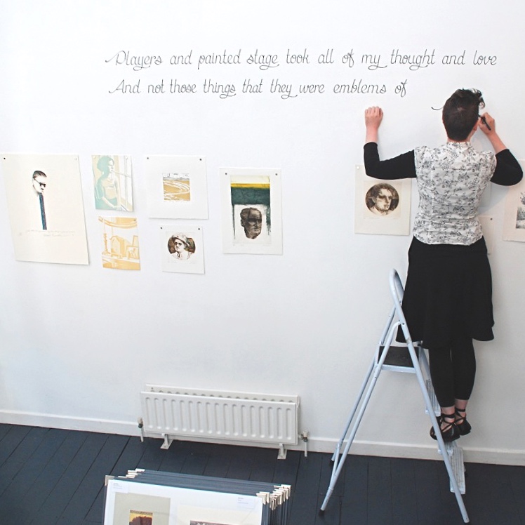 Éilís Murphy writing Yeats quote on gallery wall