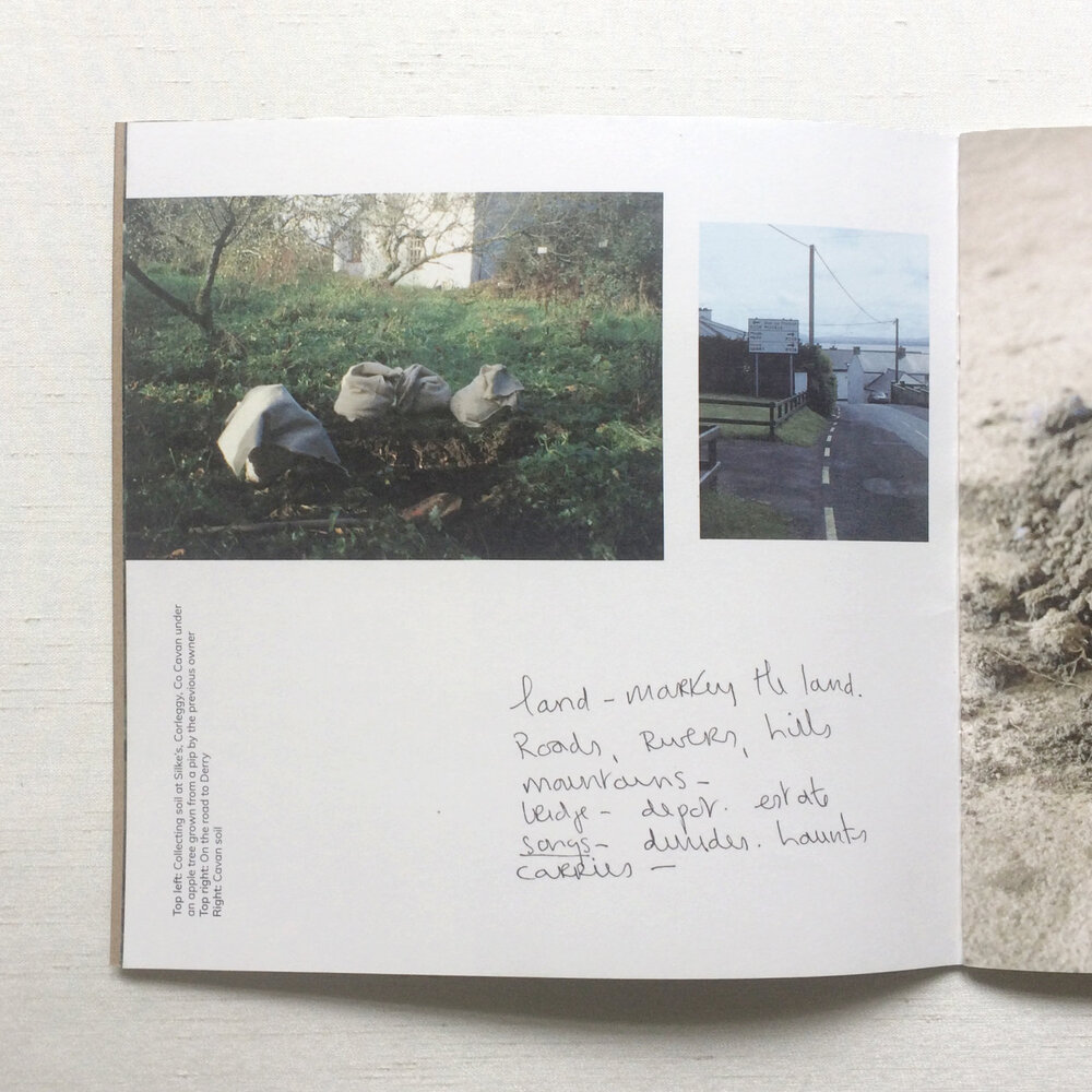 Page with two images of bags with soil alongside handwritten text by artist