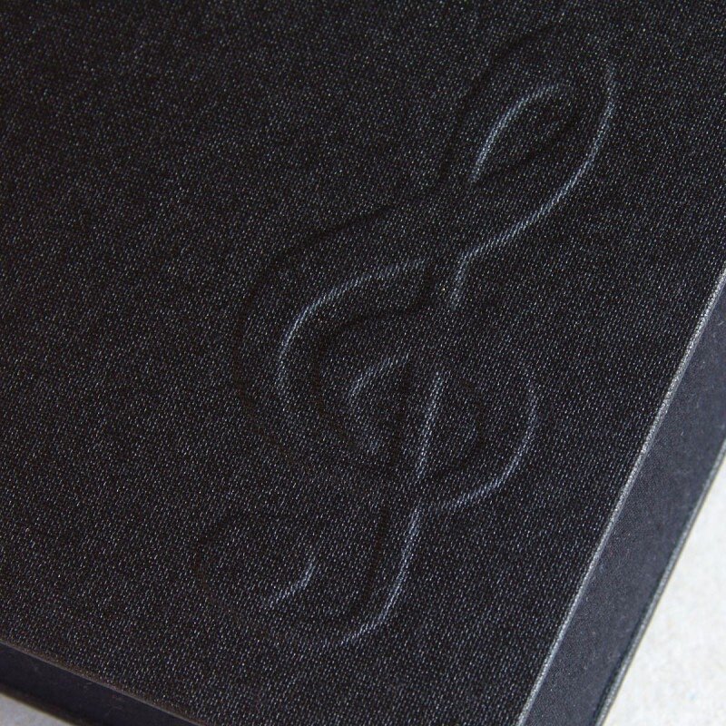 Clef symbol embossed on cover