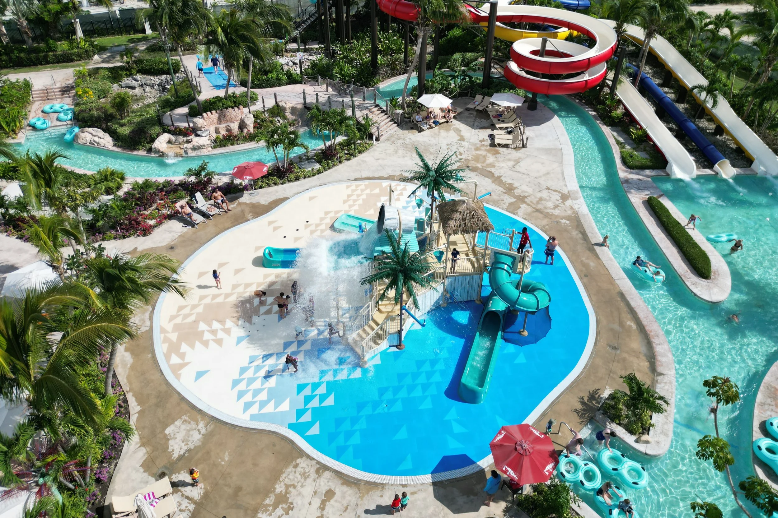 Beaches Turks and Caicos splash pad and slides, people playing on Life Floor Safety Surfacing.
