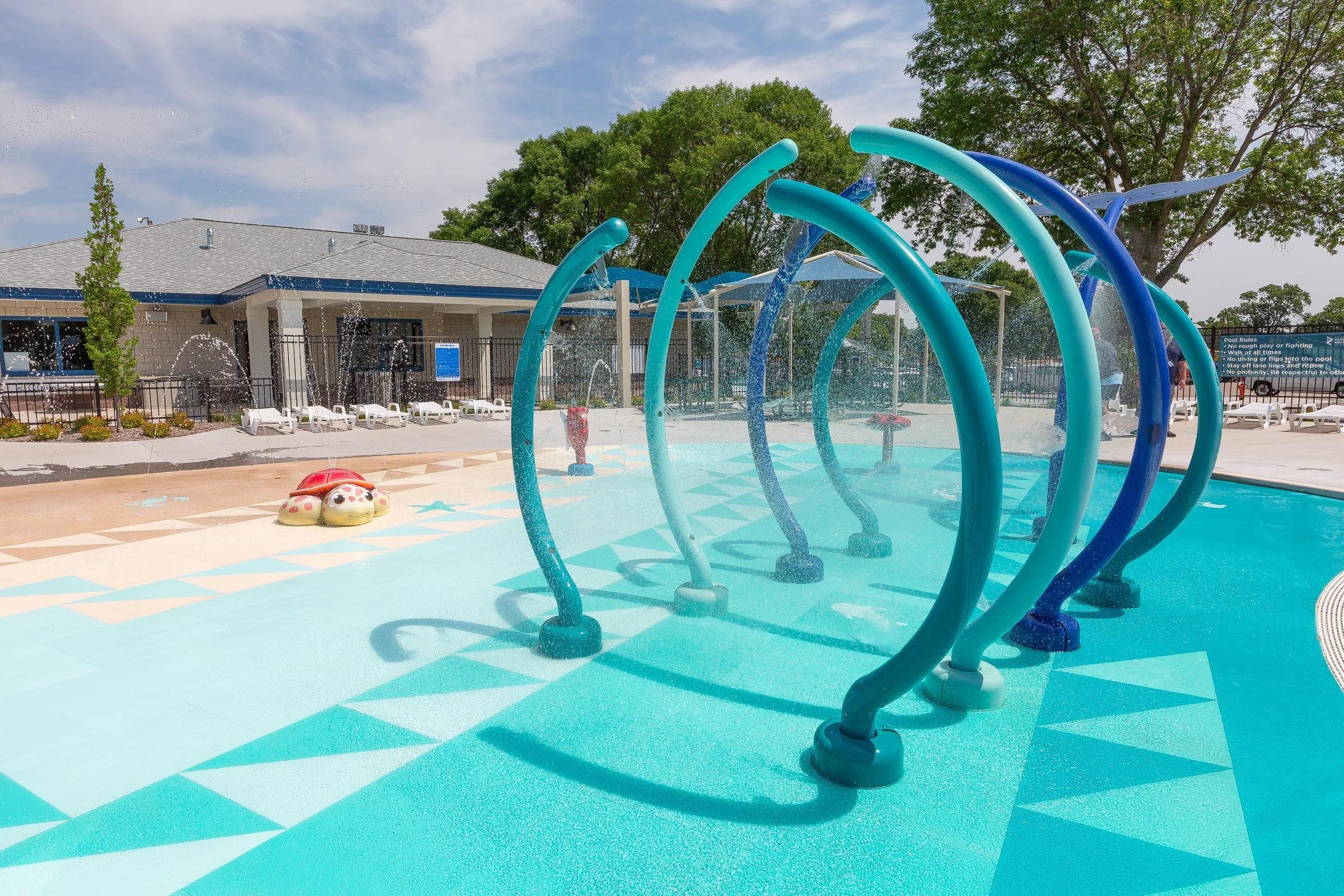 Soldiers Field Aquatic Center, Life Floor aqua tile splash pad surfacing