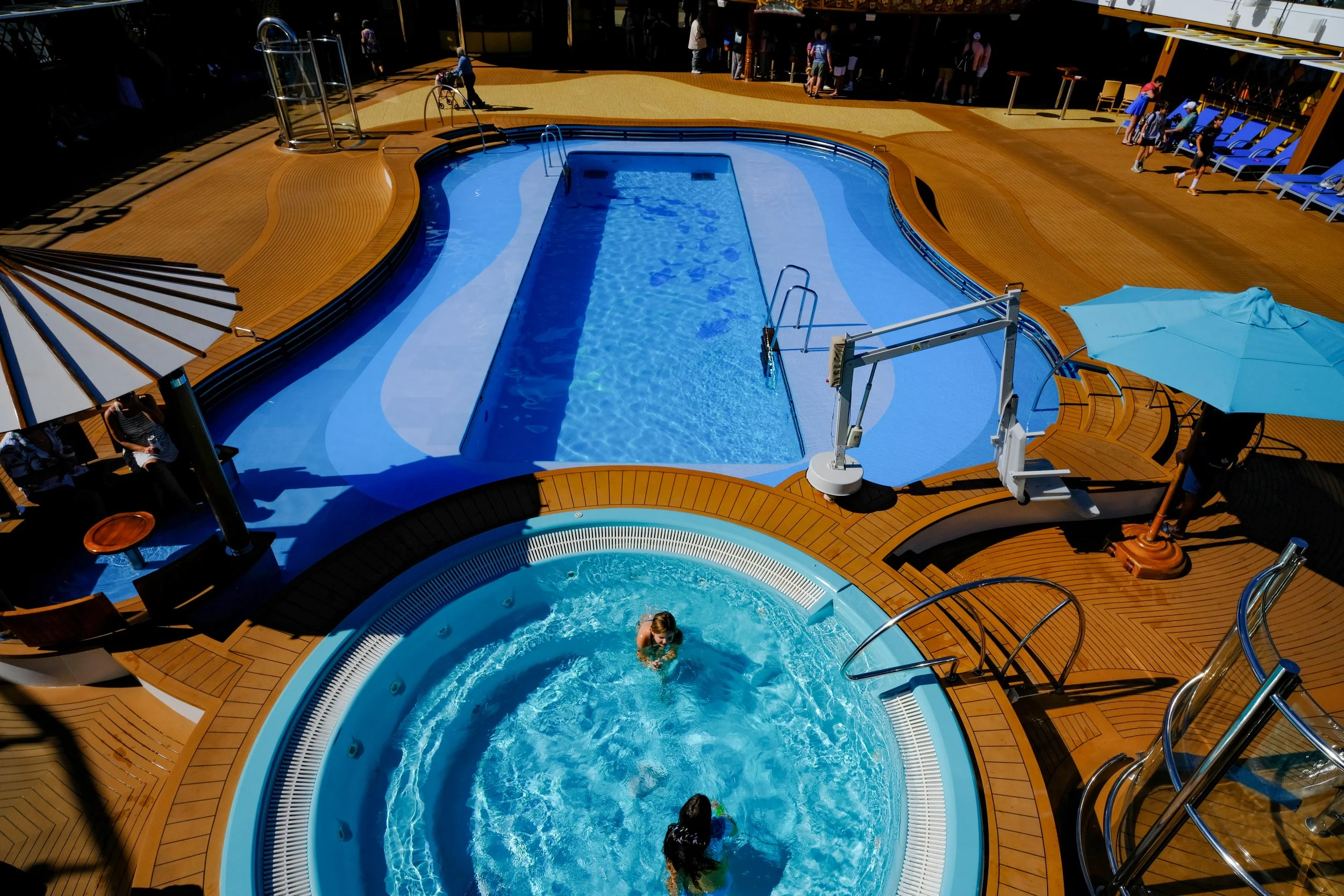 Carnival Mardi Gras birds eye view of pool and hot tub with Life Floor surrounding pool.