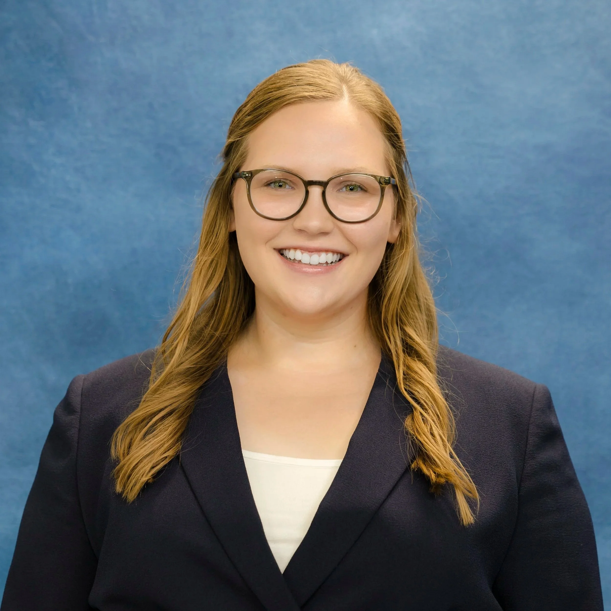 Headshot of Sydney Pedersen with IBCCES