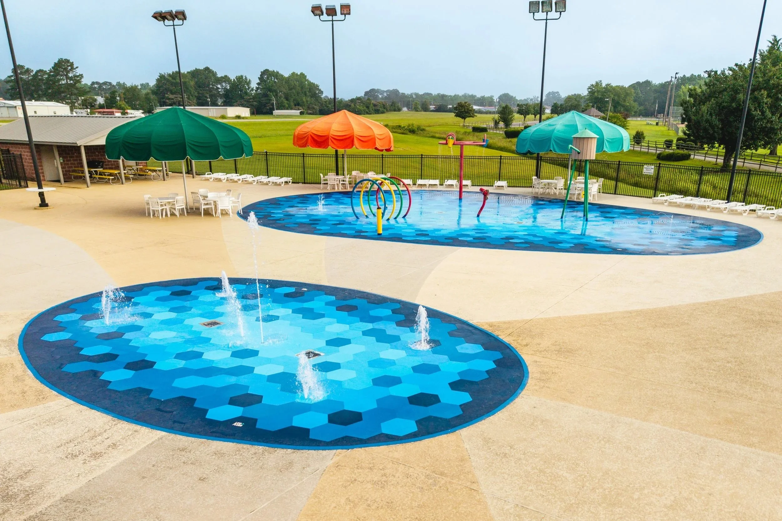 Two splash pads with Life Floor splash pad surface tiles, Splash pad ideas