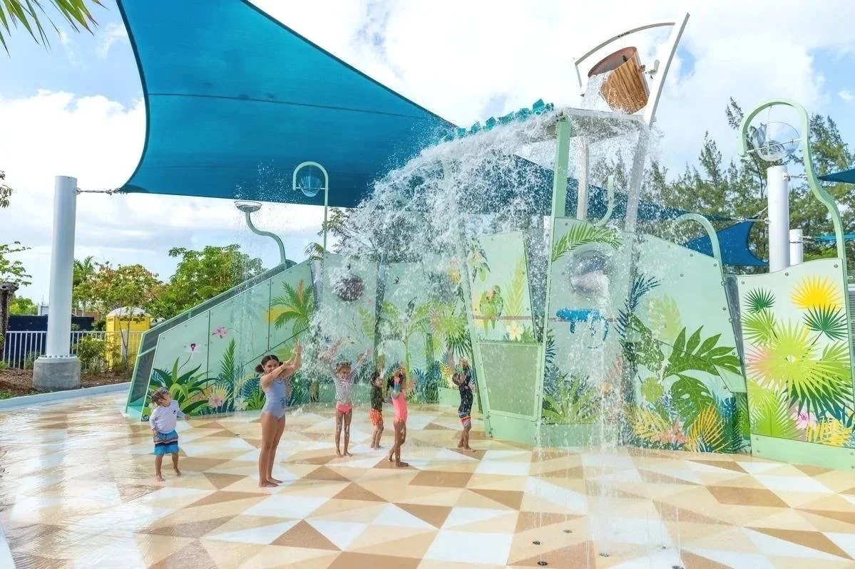 Kimpton Seafire Resort + Spa with Life Floor aquatic safety surfacing and children playing on splash pad