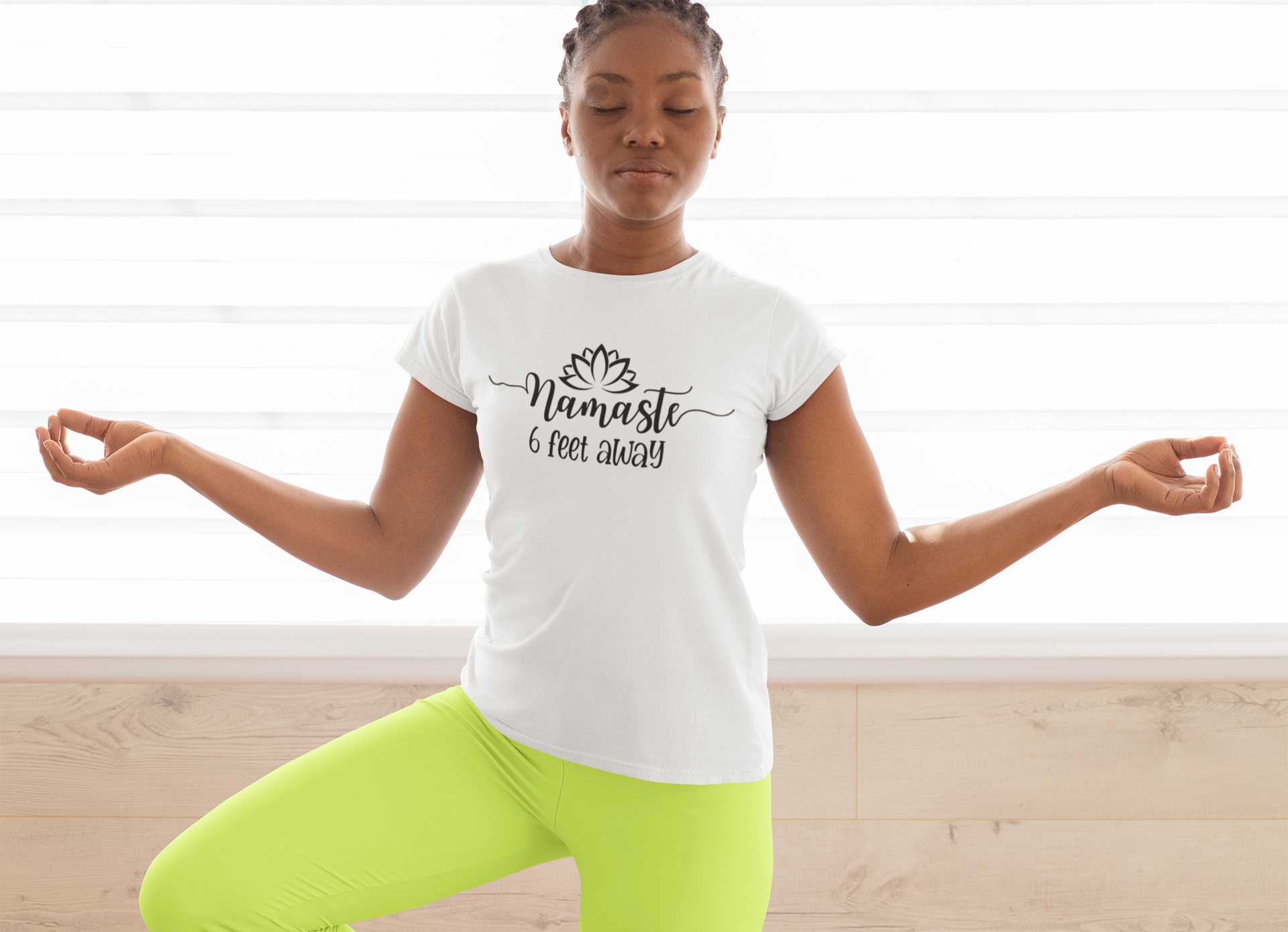 t-shirt-mockup-featuring-a-woman-doing-the-tree-pose-31093.png