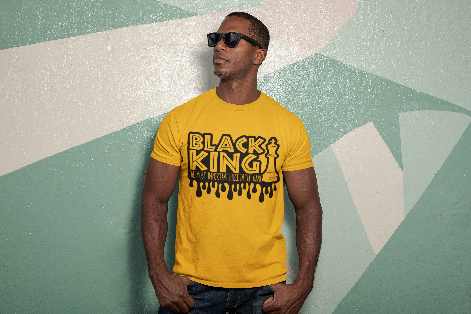 t-shirt-mockup-featuring-a-man-wearing-sunglasses-by-a-painted-wall-30450.png