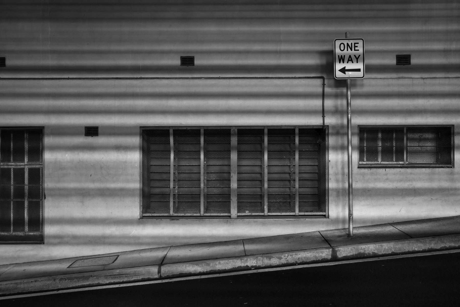 Shadows against a wall in the Brisbane CBD at night