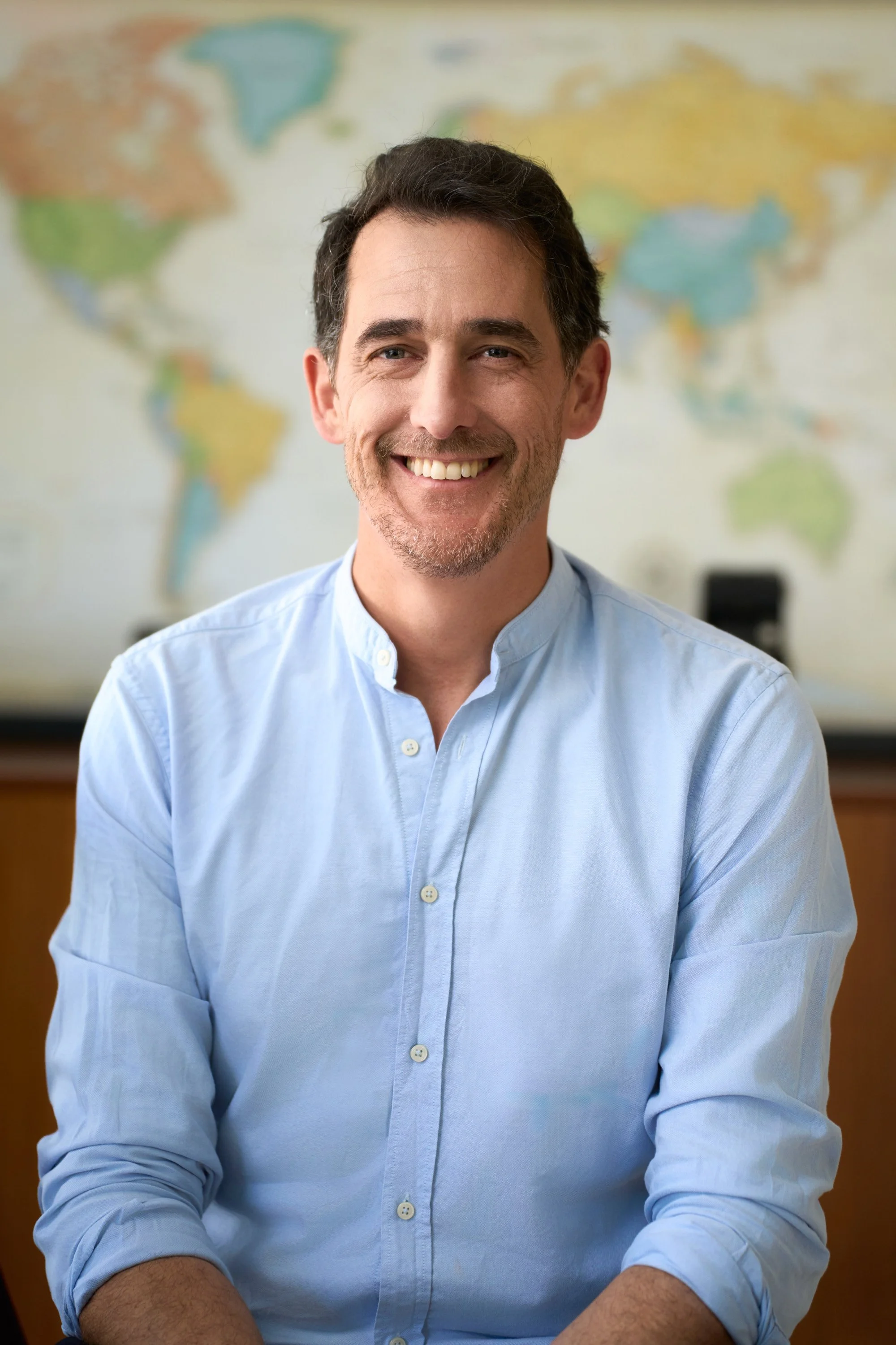 office-headshot-with-world-map-malta.jpg