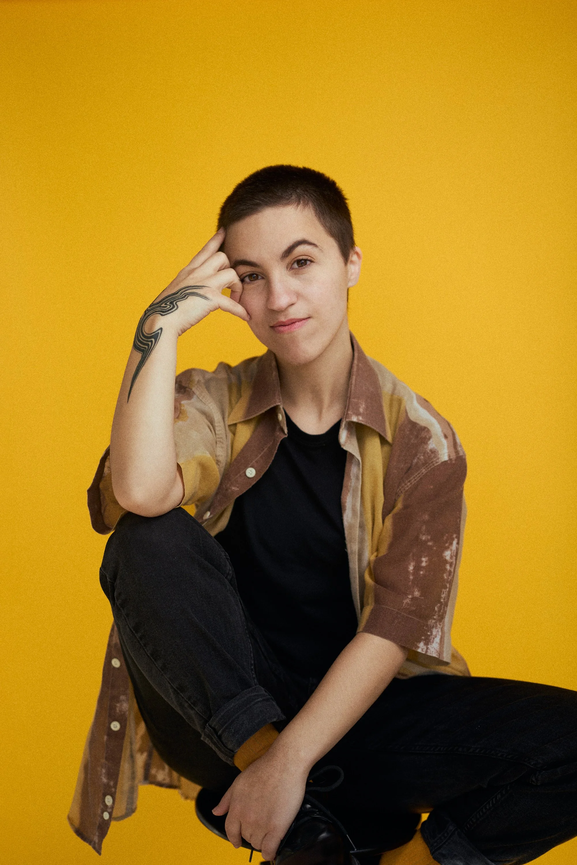 sara-yellow-backdrop-headshot-malta.jpg