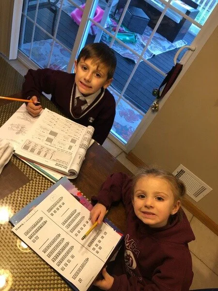 kids doing homework.jpg