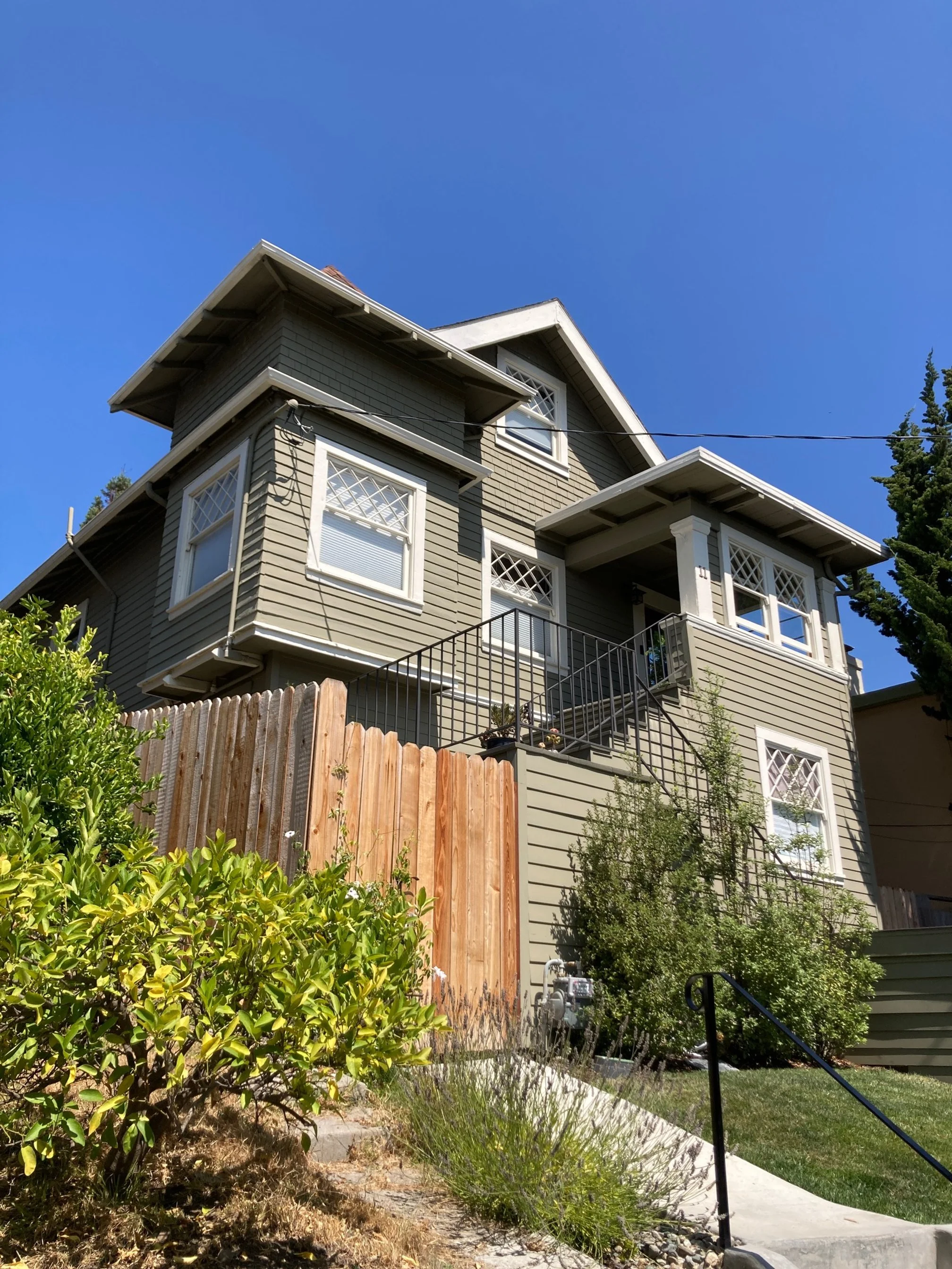  Before: Two-story shingle with second-floor entry 