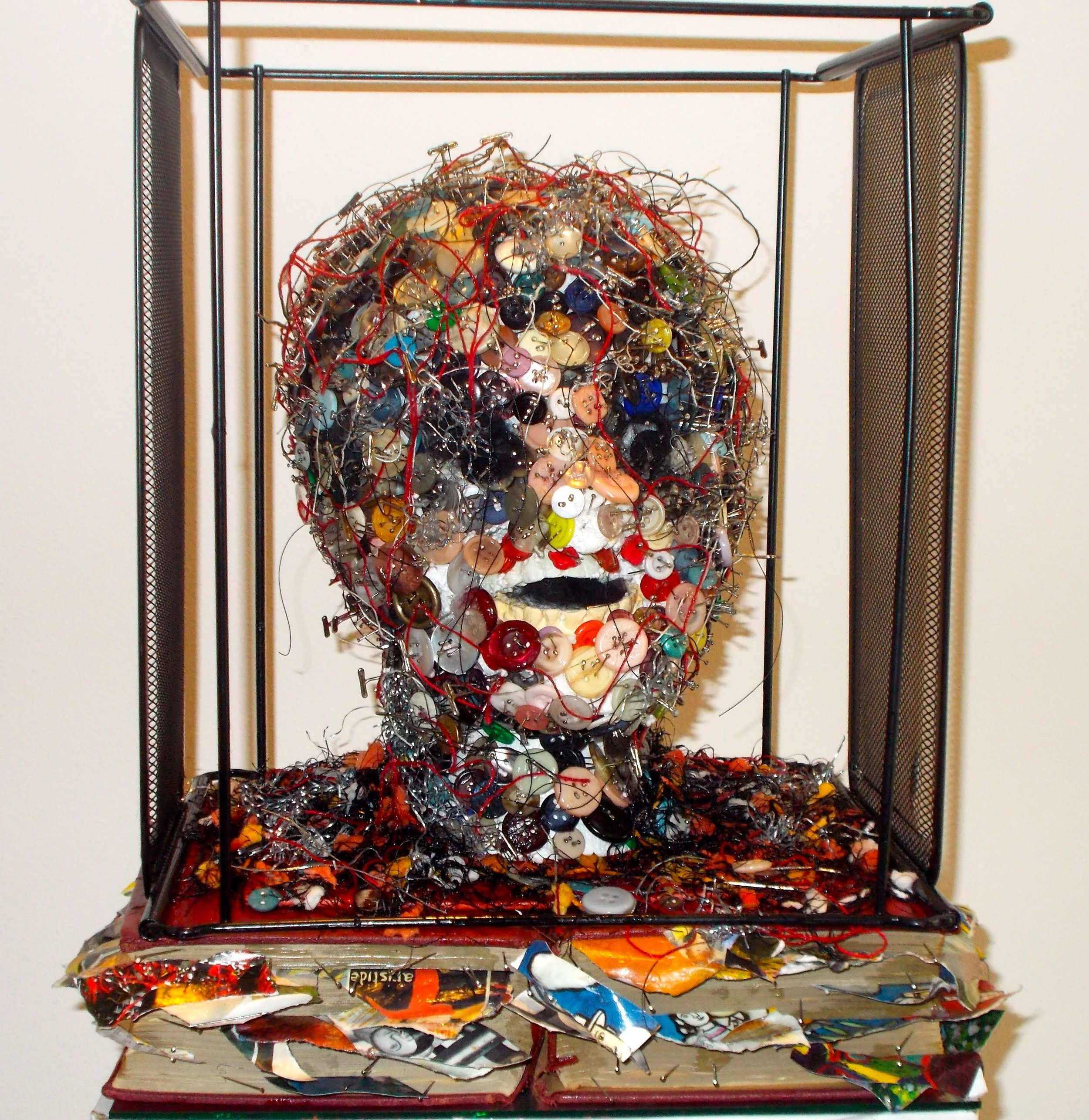  buttons,glass,wire, paper,metal  12” x 14” x 9” 