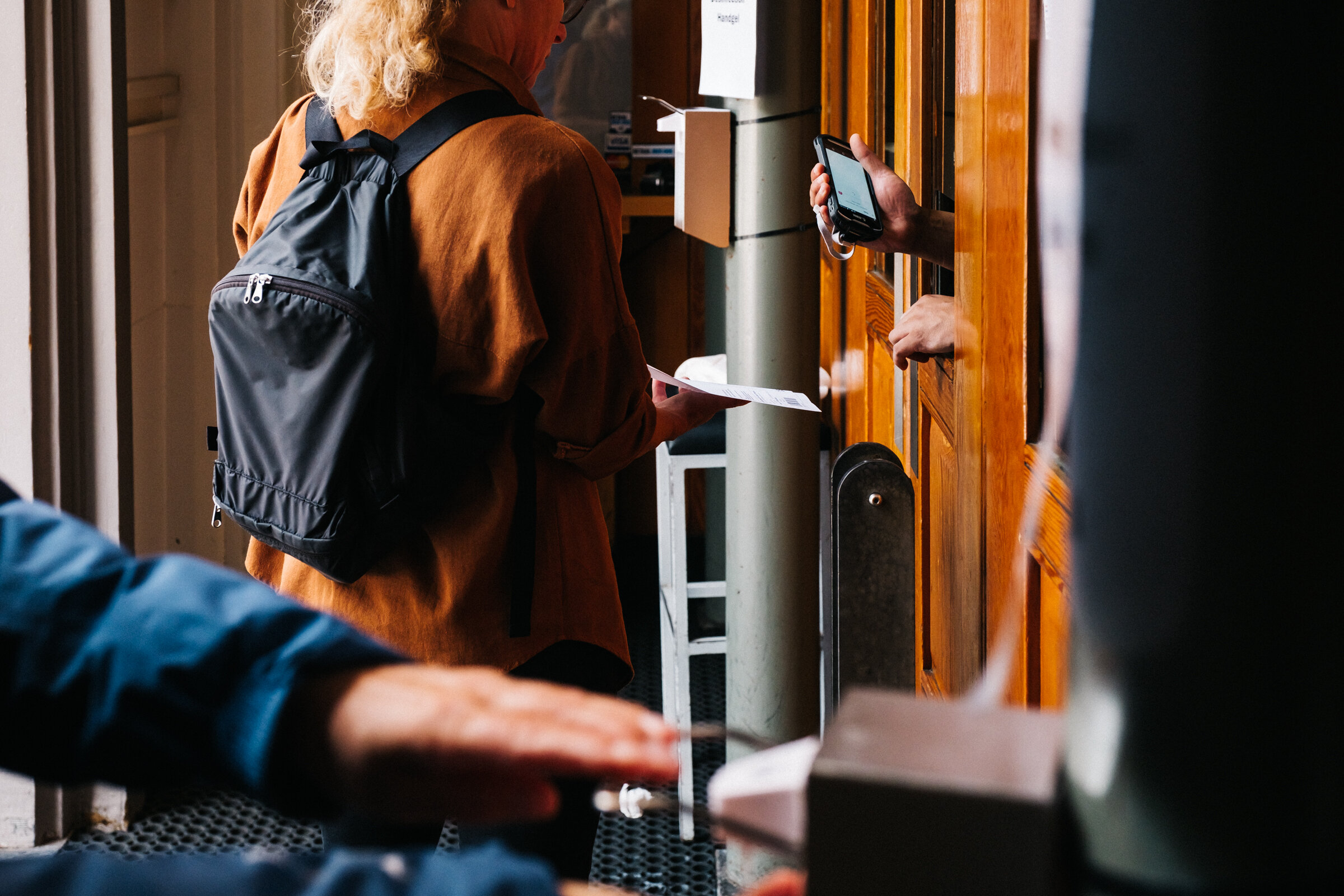  Visitors have their tickets scanned by security behind protective plastic and can disinfect their hands at Paradiso, Amsterdam, September 6, 2020.  