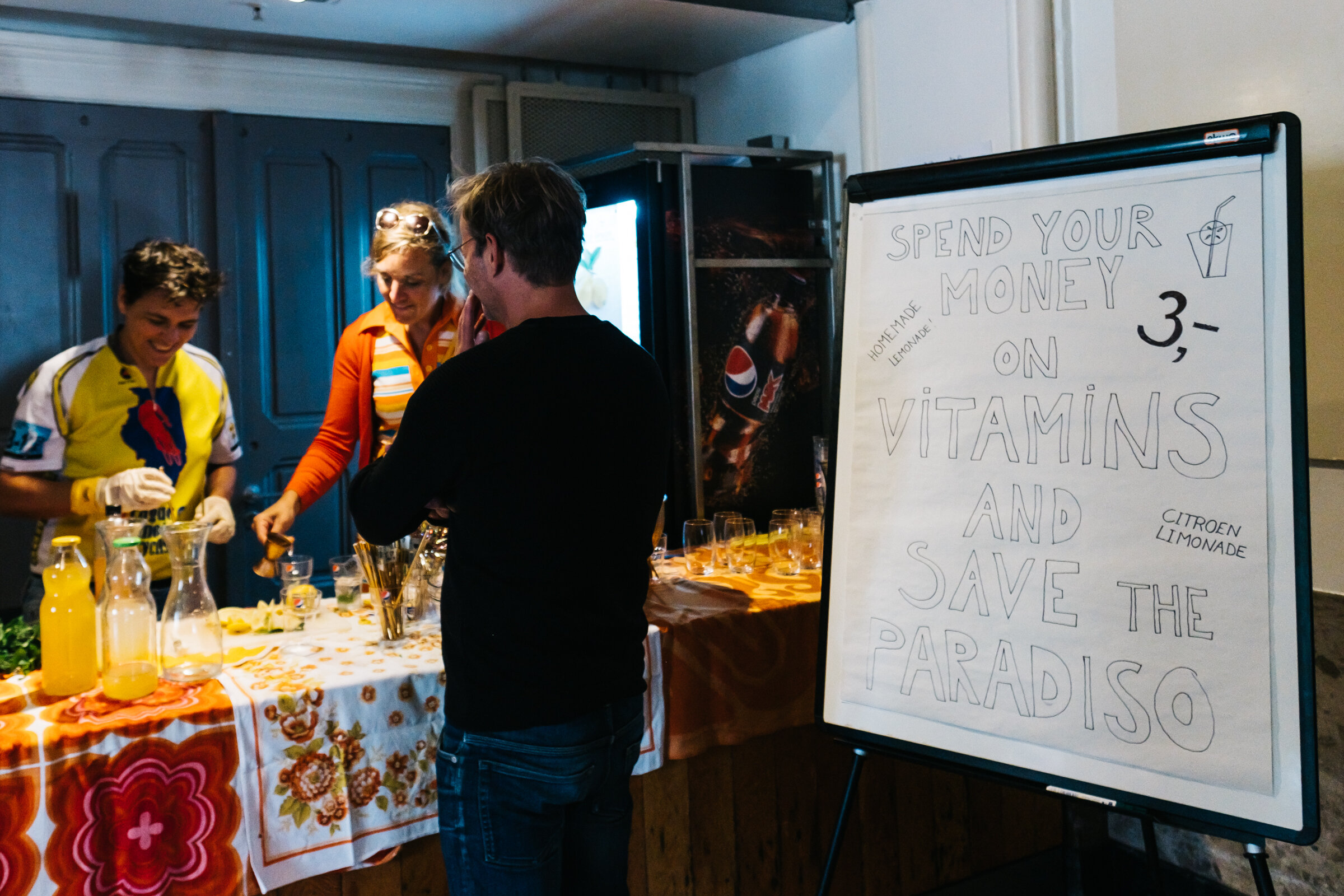  A man waits as his drink is being prepared by Paradiso volunteers at the Parafanalia pop-up market at Paradiso, Amsterdam, August 30, 2020. Some stalls are manned by Paradiso volunteers, staff members or employees, selling a range of products with t