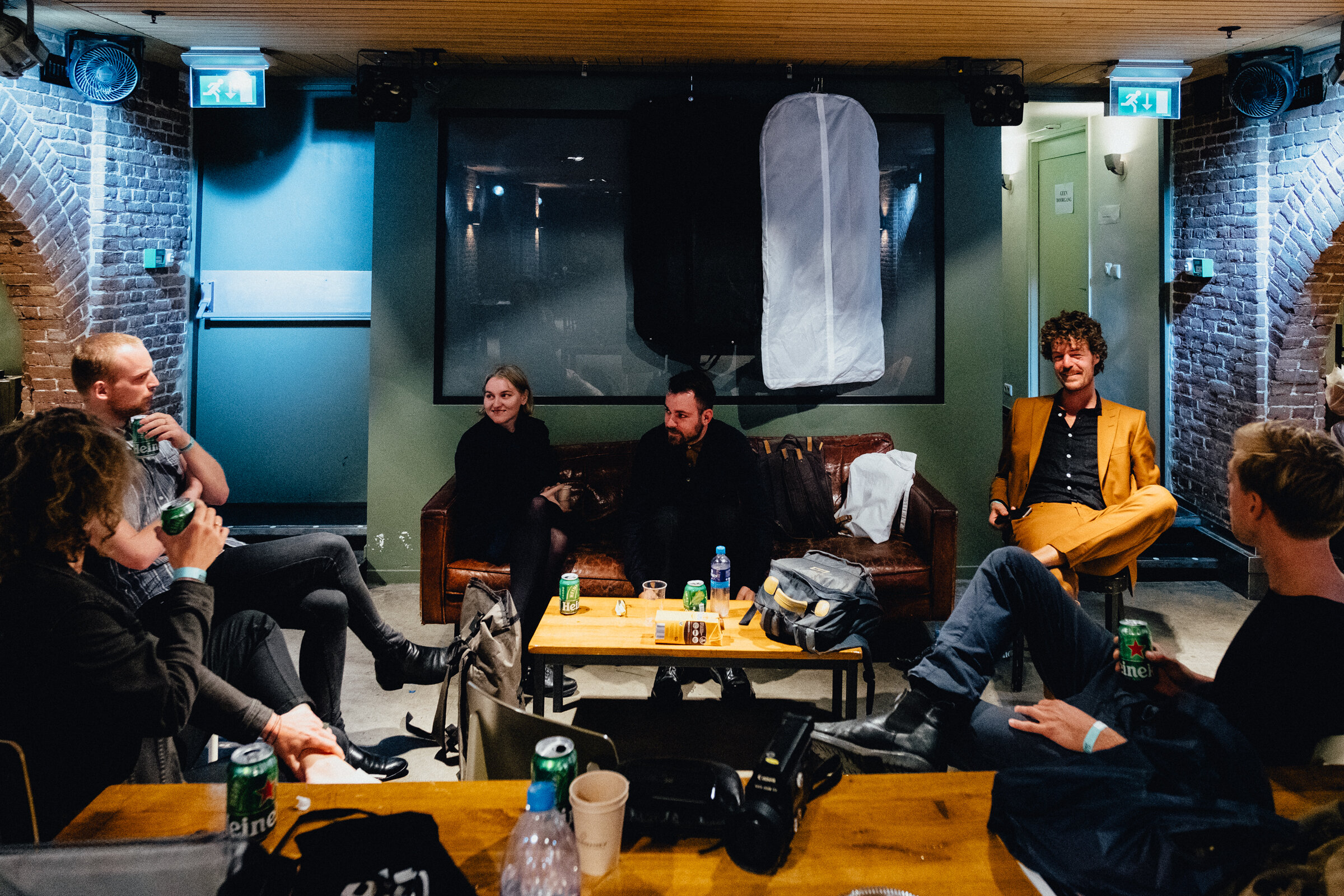  The band Classic Water waits in the new backstage area before their show at Paradiso, Amsterdam, August 25, 2020. The new backstage is the old basement cafe and the smallest stage. The backstage rooms normally used are too small because of the requi