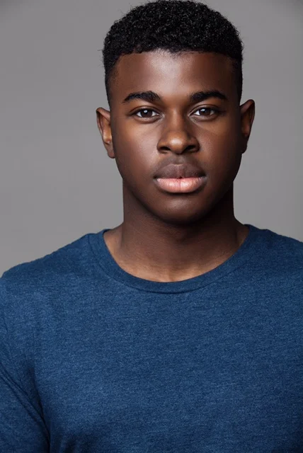Lee's headshot (semi-smile).jpg