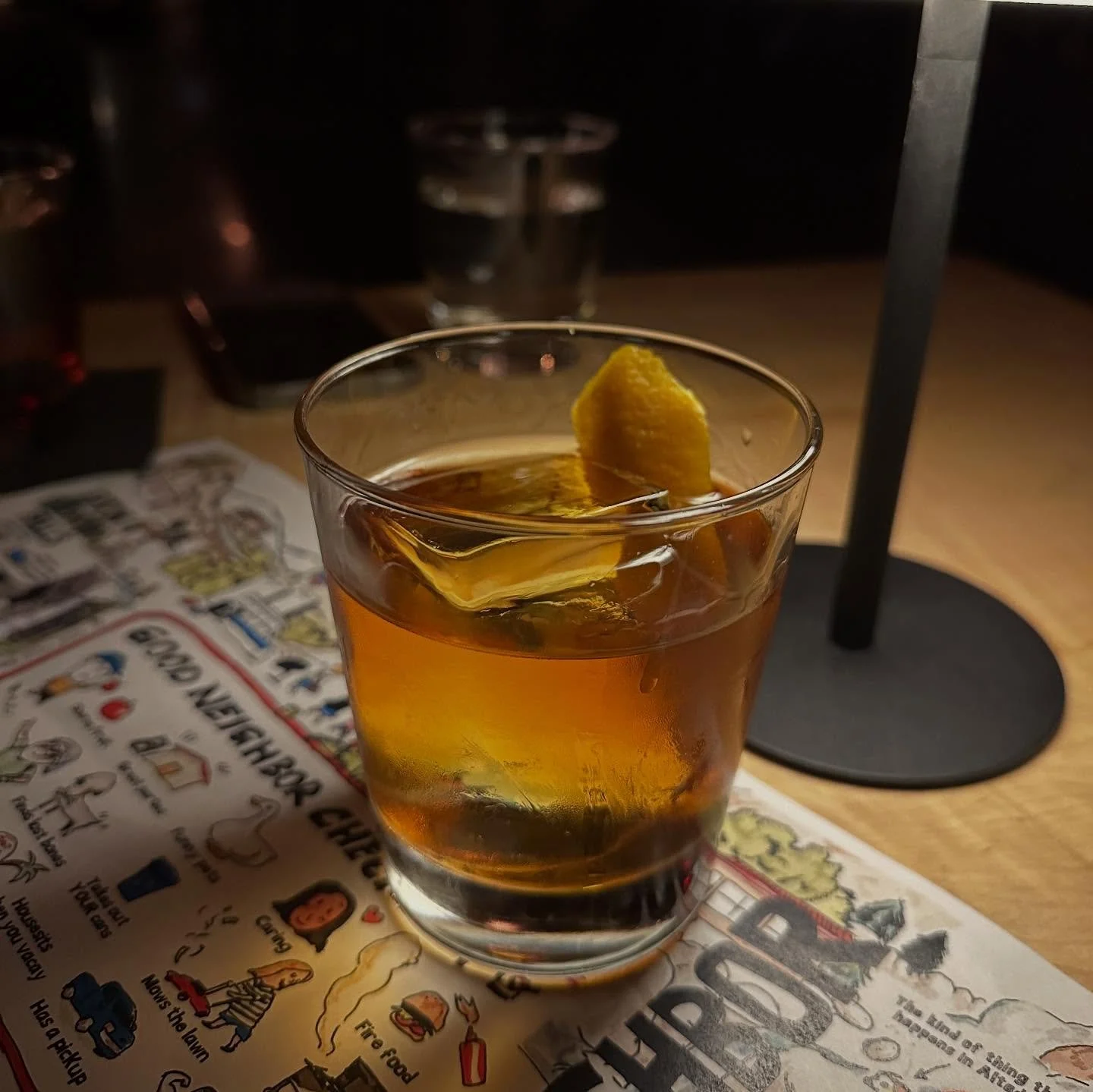 .
sean sits as he waits in his chair
to welcome in friends from the outside air.

good neighbors pour inside
like a drink into a glass.
and a moth to a flame
good neighbor bar
collectively we came.

with a nod and a wink
i&rsquo;m swept right inside.