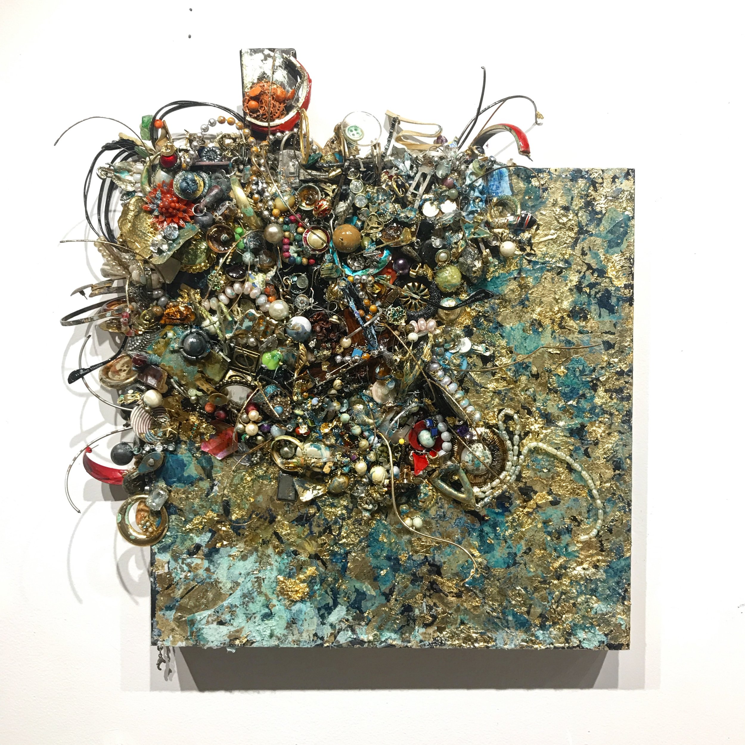   Embroachment  1, 2019, costume jewelry, found objects, plaster, gold leaf and resin on panel, 15x15” 