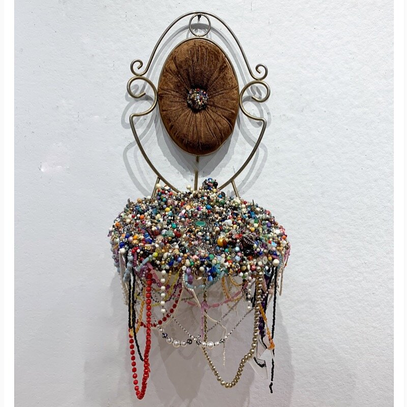   Best Seat in the House,  2019, costume jewelry, beads, and resin on brass chair 