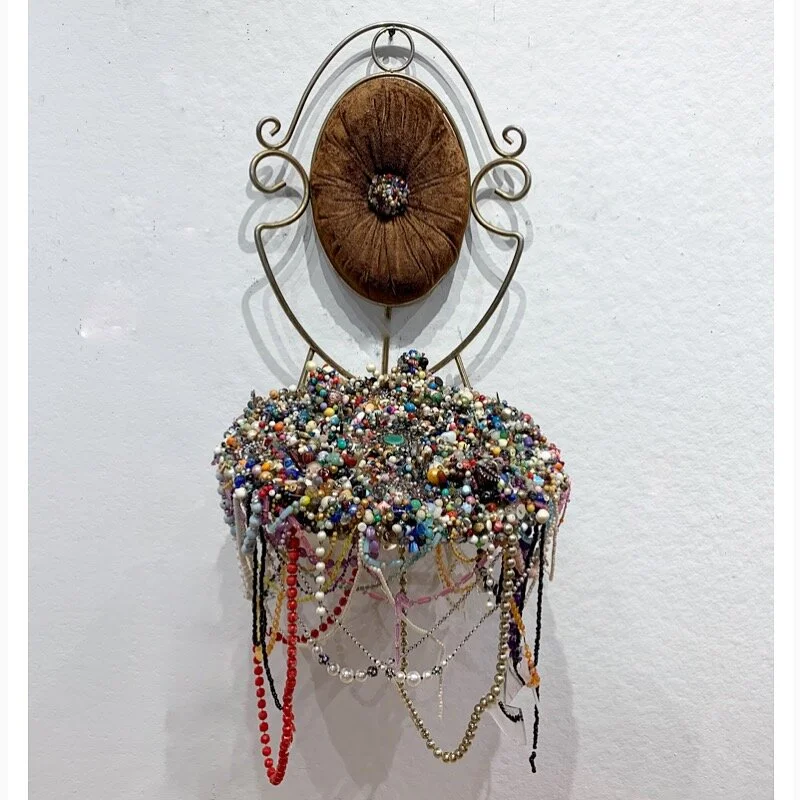   Best Seat in the House,  2019, costume jewelry, beads, and resin on brass chair 
