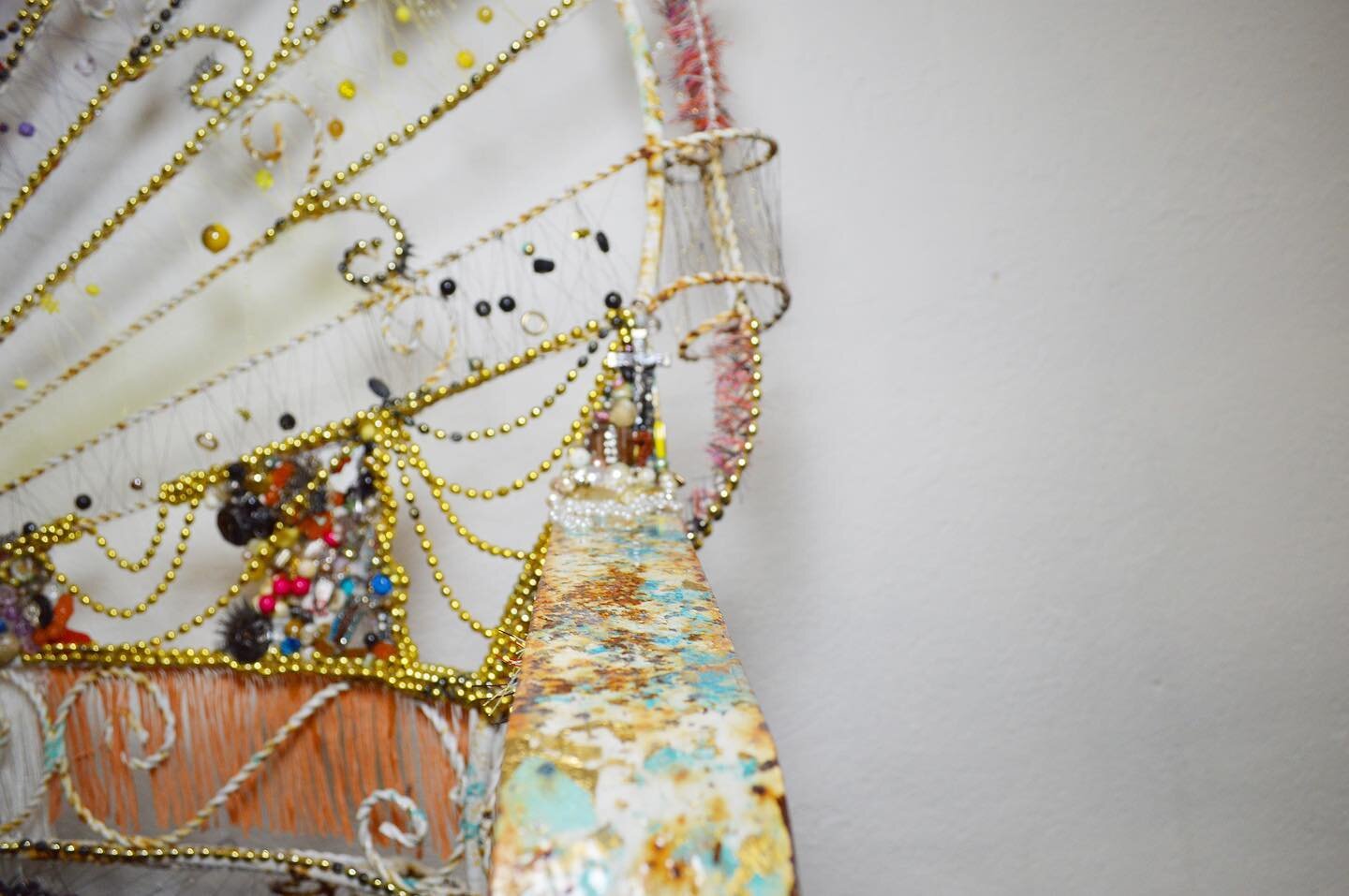 Detail of &lsquo;Garden Bench&rsquo;, I love the way gold leaf and blue patina look together #assemblageart #bluepatina #goldleaf #bench #costumejewelry #beads #necklace #art912 #gold #fringe