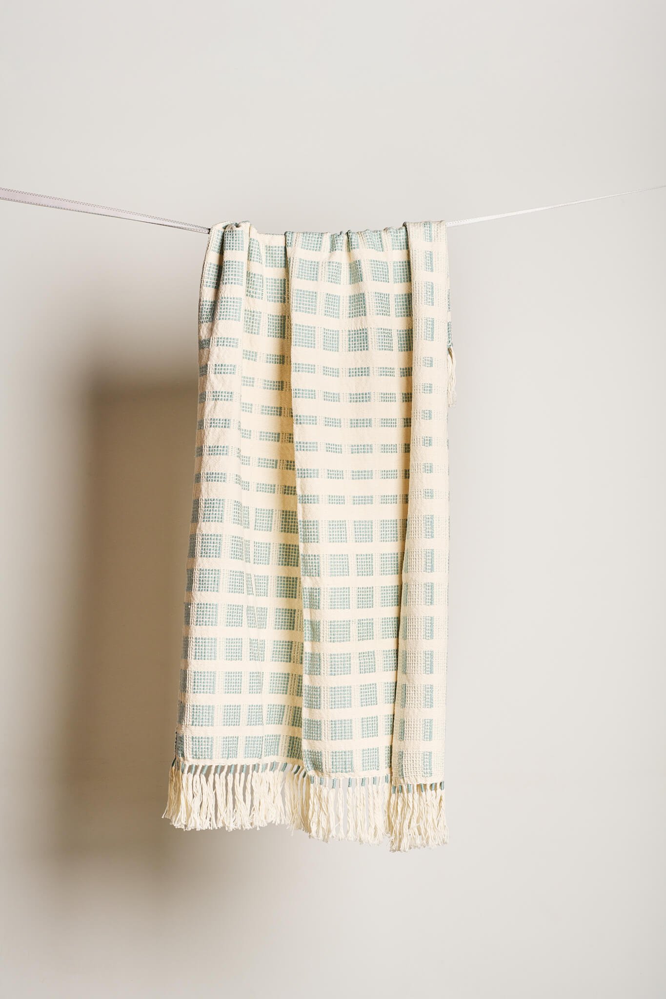 Baru_Small_Throw_Seaglass_Blue_Hanging_Zuahaza.jpg