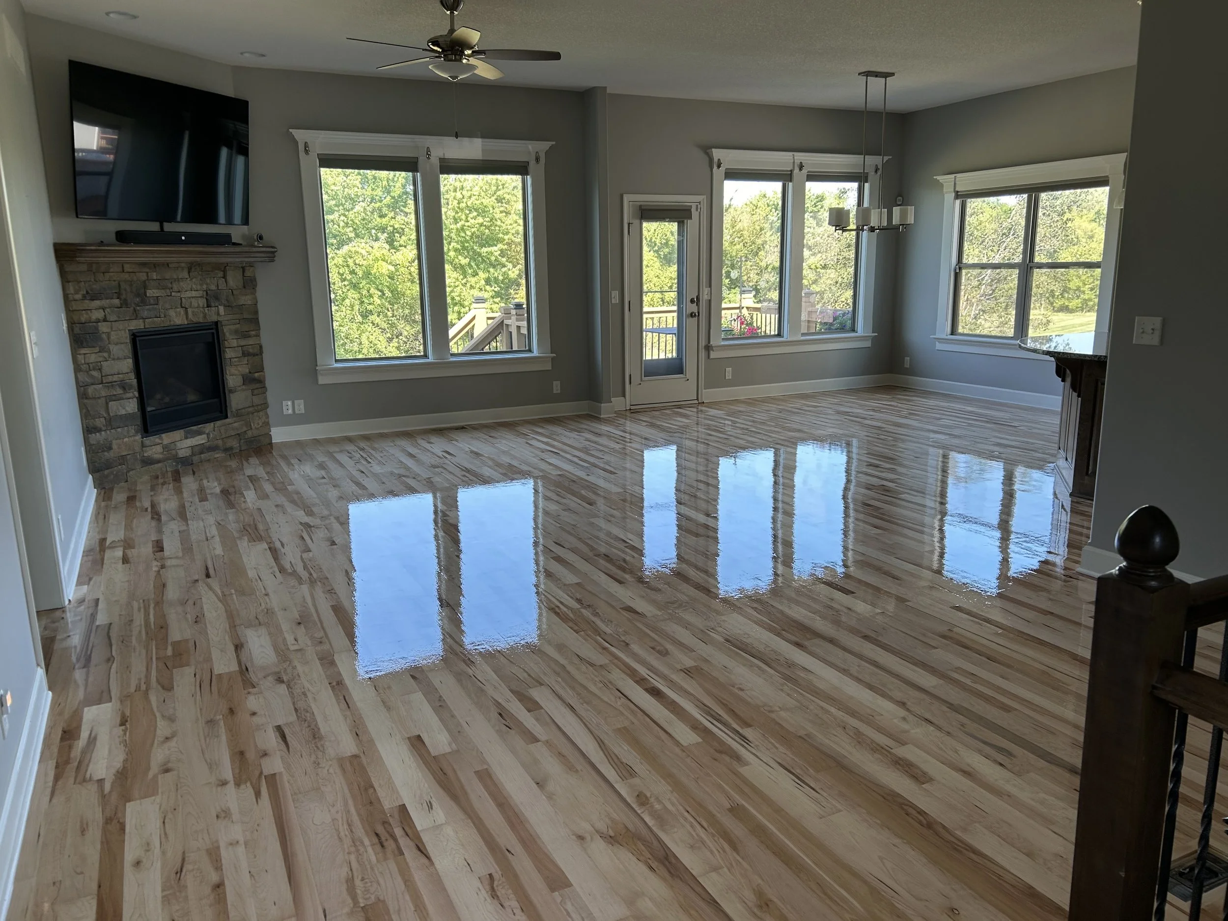 Natural maple hardwood floor after sanding and refinishing