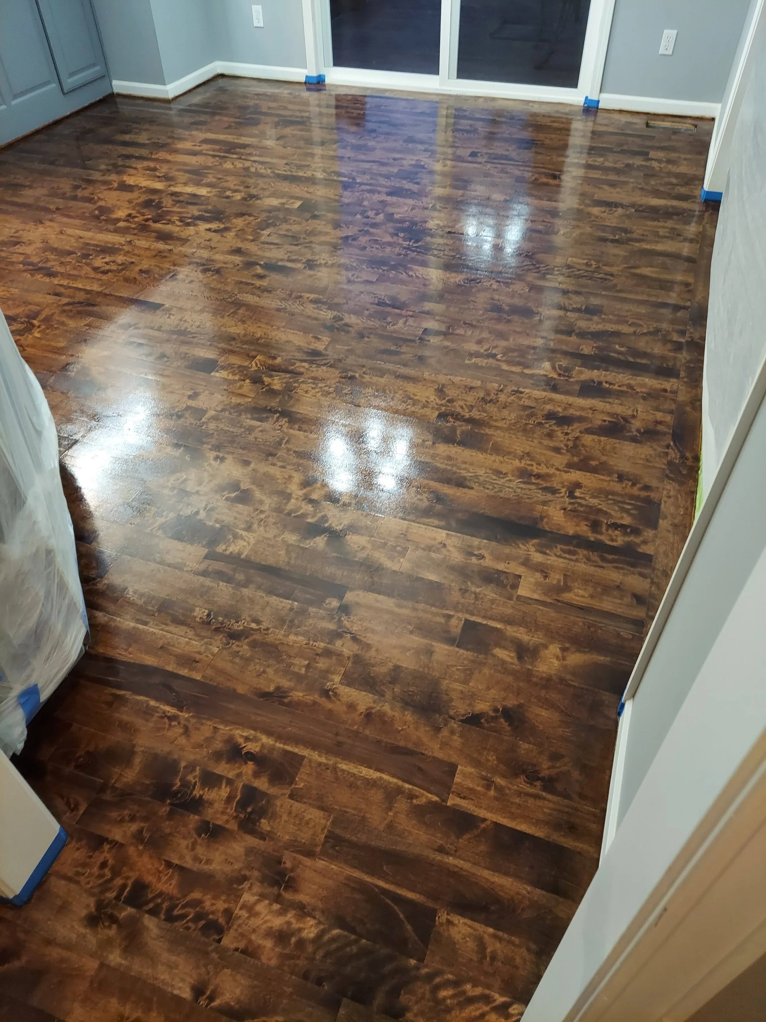 Dark stained hardwood floor refinishing
