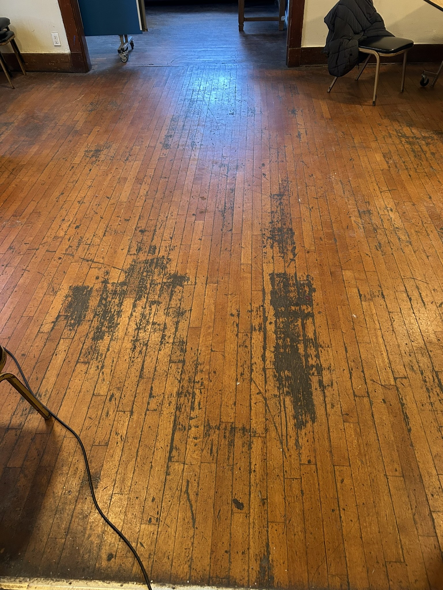 120-year-old hardwood floor before restoration