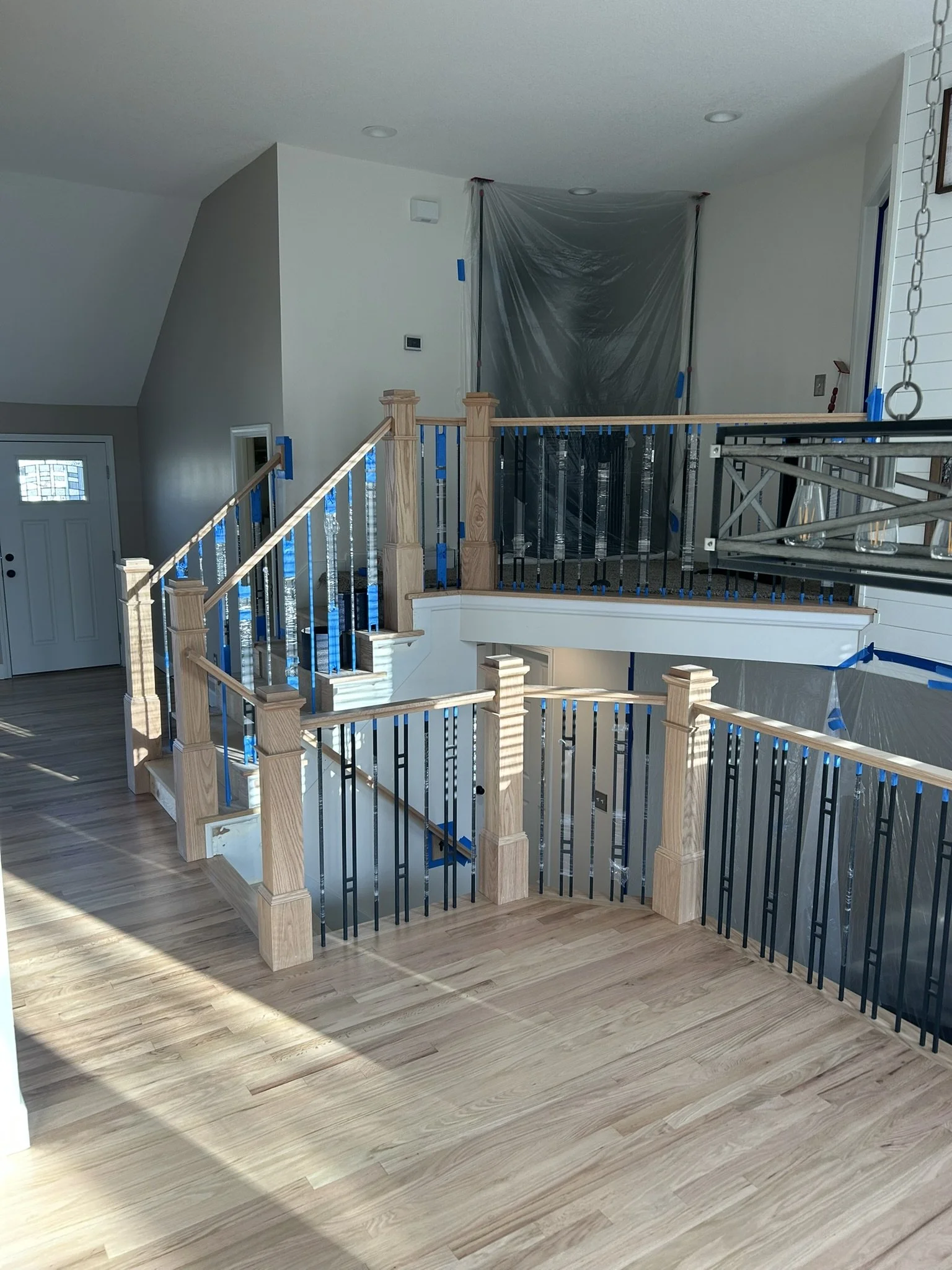 Custom staircase and railing installation in progress
