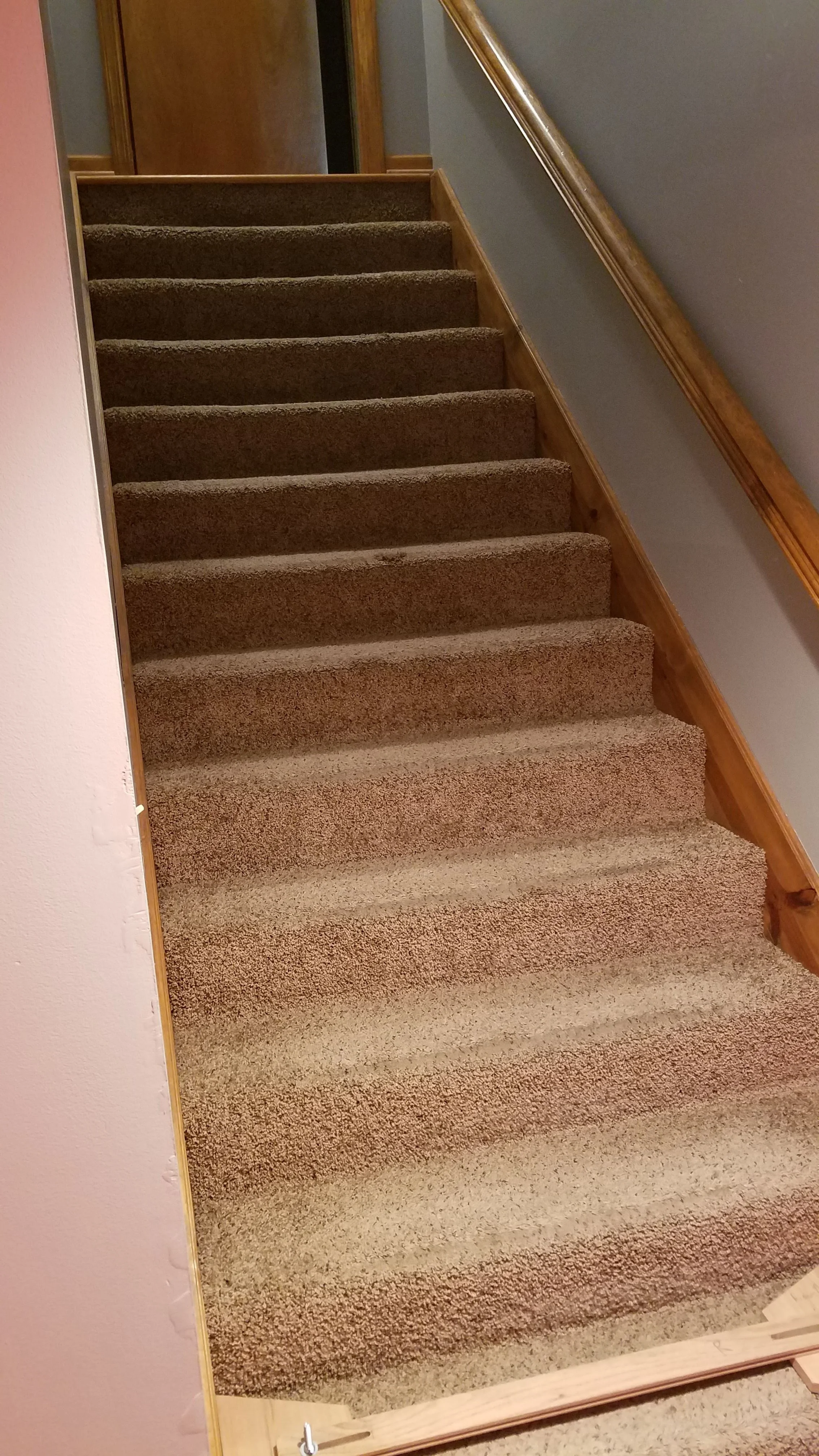 Carpeted staircase before hardwood conversion