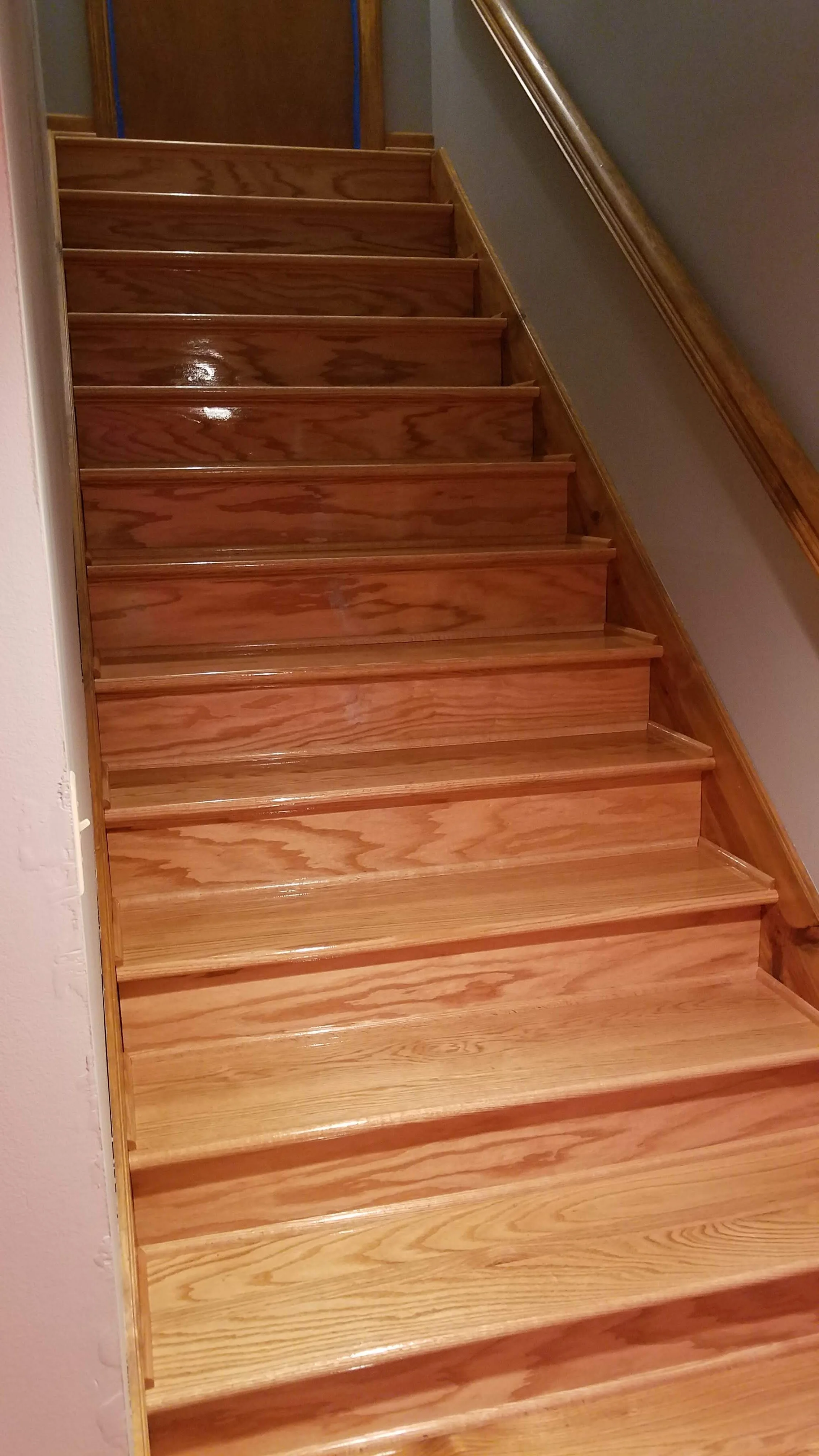 Finished hardwood staircase after carpet removal